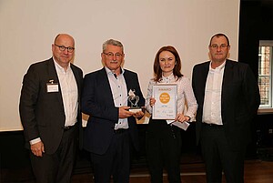 Christoph Weiss (1st from left), Managing Partner of the BEGO group, and Jürgen Schultze (4th from left), Head of International Sales at BEGO Bremer Goldschlägerei and BEGO Medical, awarded the Wilhelm-Herbst-Award 2017 to Sergey Molchanov (2nd from left), Managing Director ECHO, and Alla Didenko (3rd from left), Head of Customer Service at ECHO.